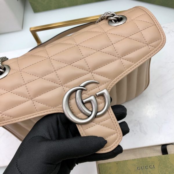 On this small shoulder bag, classic materials are combined with vertical and herringbone patterns to create a distinctive geometric style design. - Image 5
