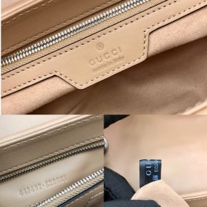 On this small shoulder bag, classic materials are combined with vertical and herringbone patterns to create a distinctive geometric style design.