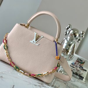 Capucines medium size handbag M21652 with Paris pink gold buckle