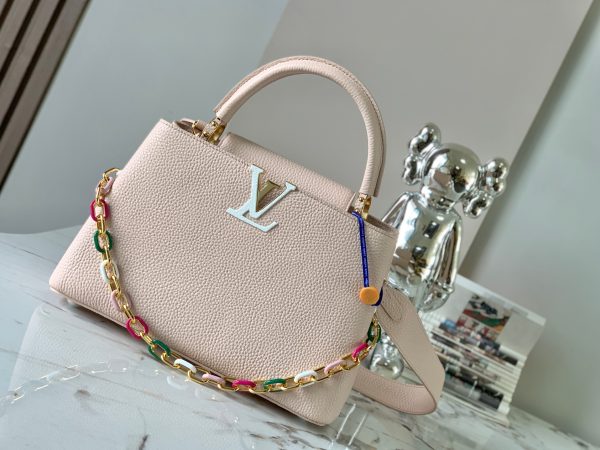 Capucines medium size handbag M21652 with Paris pink gold buckle