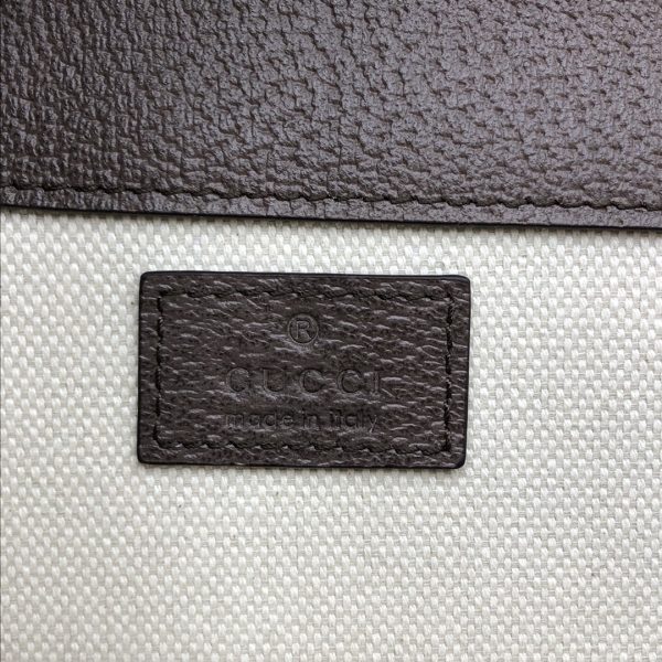 This Dionysus series mini tote bag is made of canvas with an enlarged version of the GG pattern printed on it.